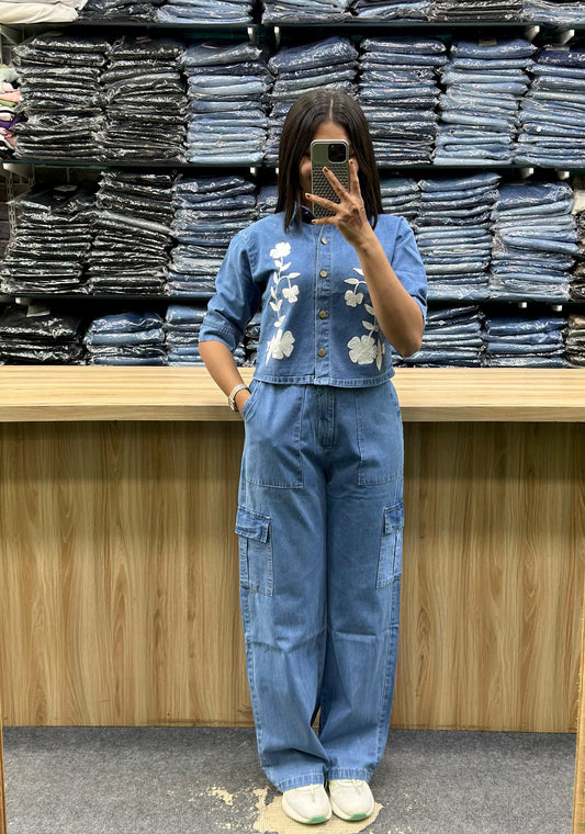 Woman wearing Vinayak Fashion women's denim cord set with floral embroidered jacket and cargo pants