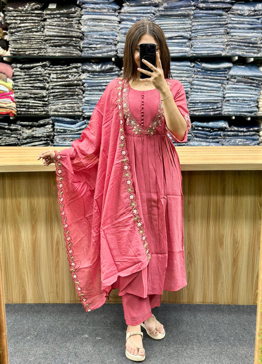 Woman wearing pink embroidered salwar suit with matching dupatta from Vinayak Fashion